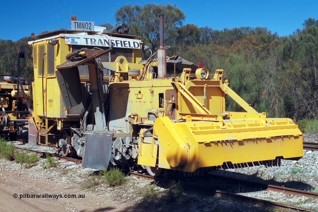 244-18
Coomunga, stabled on the siding, Transfield track machine TMN 02 ballast regulator. 6th April, 2003.
Keywords: track-machine;