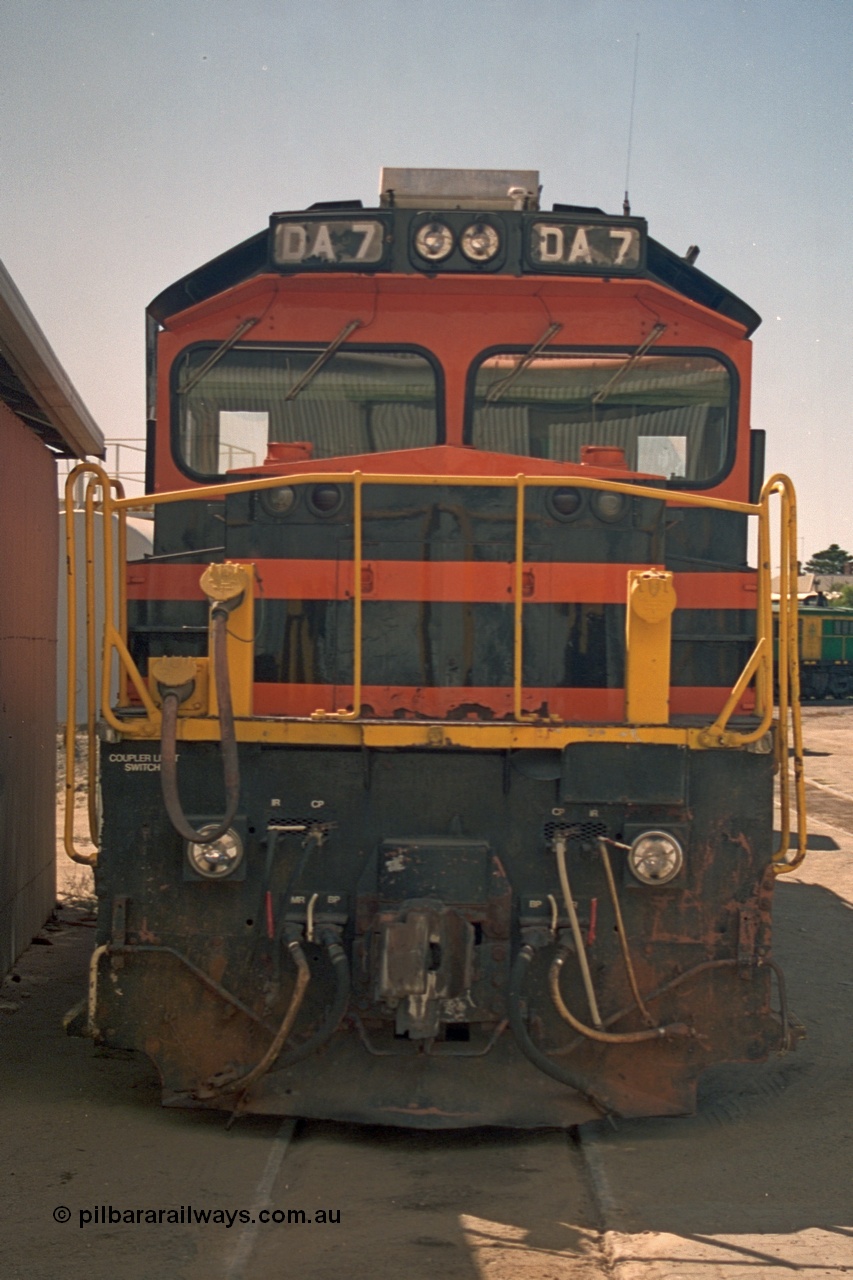 244-35
Port Lincoln loco workshops, wearing Australian Southern livery rebuild ALCo DA 7 started life as NSWGR 48 class 4813 AE Goodwin ALCo model DL531 serial 83713, rebuilt by Islington Workshops with long hood and parts from former 830 class 870 AE Goodwin ALCo model DL531 serial G6016-06 in 1998. Cab front view. 6th April 2003.
Keywords: DA-class;DA7;83713;Port-Augusta-WS;ALCo;DL531G/1;48-class;4813;rebuild;