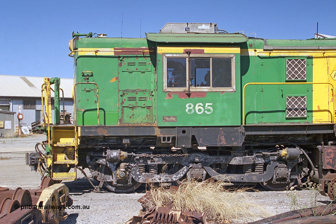 245-02
Port Lincoln loco workshops, still in former owner AN livery, Australian Southern 830 class locomotive 865 AE Goodwin ALCo model DL531 serial 84711, cab side shot. 6th April 2003.
Keywords: 830-class;865;AE-Goodwin;ALCo;DL531;84711;