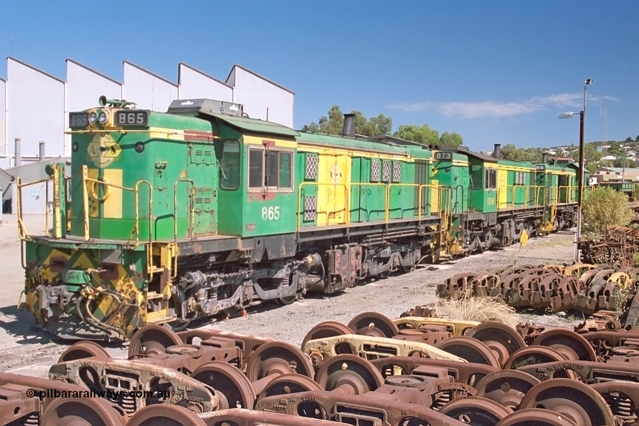 245-06
Port Lincoln loco workshops, still in former owner AN livery, Australian Southern 830 class locomotive 865 AE Goodwin ALCo model DL531 serial 84711, roster shot in multi-unit consist with sister unit 873 and DA class unit DA 6. 6th April 2003.
Keywords: 830-class;865;AE-Goodwin;ALCo;DL531;84711;