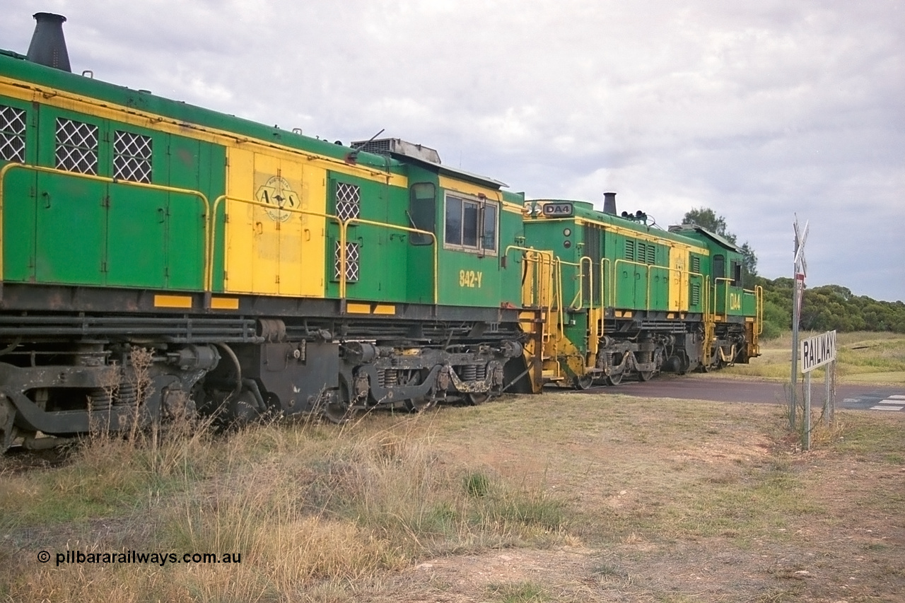 245-22
Wudinna, empty grain train shunts out of the grain siding, former Australian National Co-Co locomotives AE Goodwin ALCo model DL531 830 class units 842, serial no. 84140 and 851 serial no. 84137, 851 having been on the Eyre Peninsula since delivered in 1962. 7th April, 2003.
Keywords: 830-class;842;AE-Goodwin;ALCo;DL531;84140;