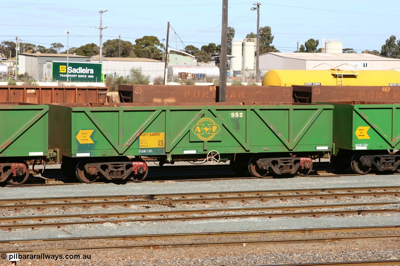 060528 4425
West Kalgoorlie, AOPY 34085, fleet number 952, one of seventy ex ANR coal waggons rebuilt from AOKF type by Bluebird Engineering SA in service with ARG on Koolyanobbing iron ore trains. They used to be three metres longer and originally built by Metropolitan Cammell Britain as GB type in 1952-55, 28th May 2006.
Keywords: AOPY-type;AOPY34085;Bluebird-Engineering-SA;Metropolitan-Cammell-Britain;GB-type;