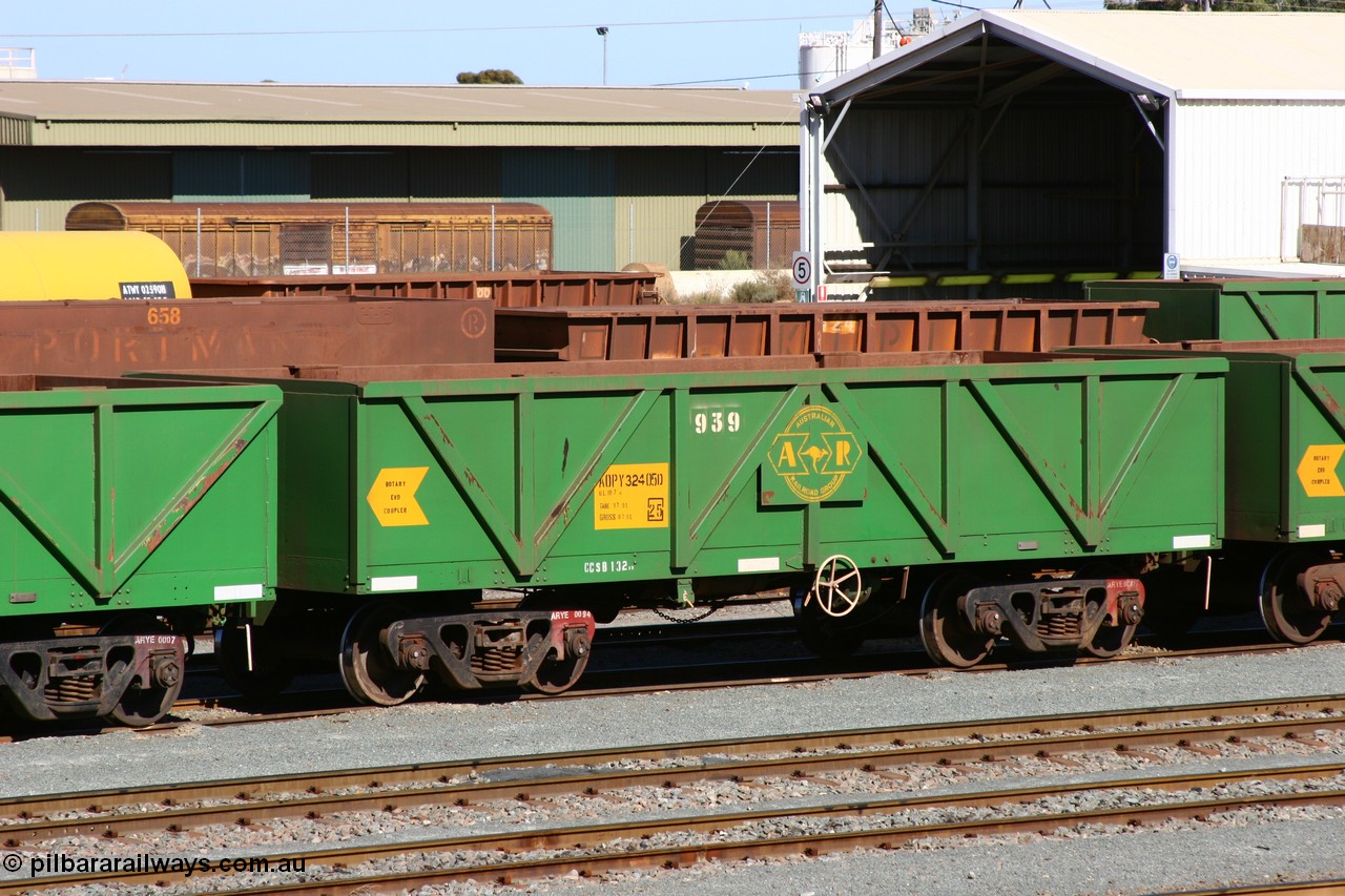 060528 4427
West Kalgoorlie, AOPY 32405, fleet number 939, one of seventy ex ANR coal waggons rebuilt from AOKF type by Bluebird Engineering SA in service with ARG on Koolyanobbing iron ore trains. They used to be three metres longer and originally built by Metropolitan Cammell Britain as GB type in 1952-55, 28th May 2006.
Keywords: AOPY-type;AOPY32405;Bluebird-Engineering-SA;Metropolitan-Cammell-Britain;GB-type;