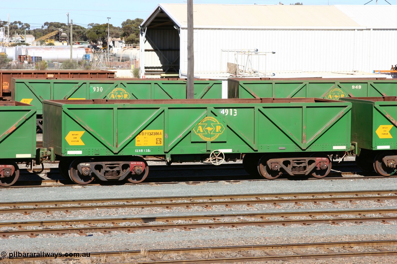 060528 4430
West Kalgoorlie, AOPY 32386 with fleet number 4913, the 4 being a recent addition, one of seventy ex ANR coal waggons rebuilt from AOKF type by Bluebird Engineering SA in service with ARG on Koolyanobbing iron ore trains. They used to be three metres longer and originally built by Metropolitan Cammell Britain as GB type in 1952-55, 28th May 2006.
Keywords: AOPY-type;AOPY32386;Bluebird-Engineering-SA;Metropolitan-Cammell-Britain;GB-type;