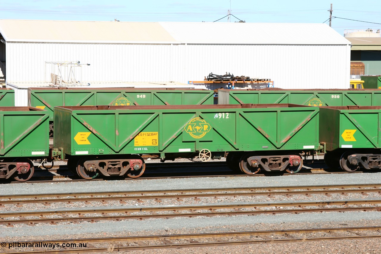 060528 4431
West Kalgoorlie, AOPY 32384 with fleet number 4912, the 4 being a recent addition due to the increasing size of the ore waggon fleet, one of seventy ex ANR coal waggons rebuilt from AOKF type by Bluebird Engineering SA in service with ARG on Koolyanobbing iron ore trains. They used to be three metres longer and originally built by Metropolitan Cammell Britain as GB type in 1952-55, 28th May 2006.
Keywords: AOPY-type;AOPY32384;Bluebird-Engineering-SA;Metropolitan-Cammell-Britain;GB-type;