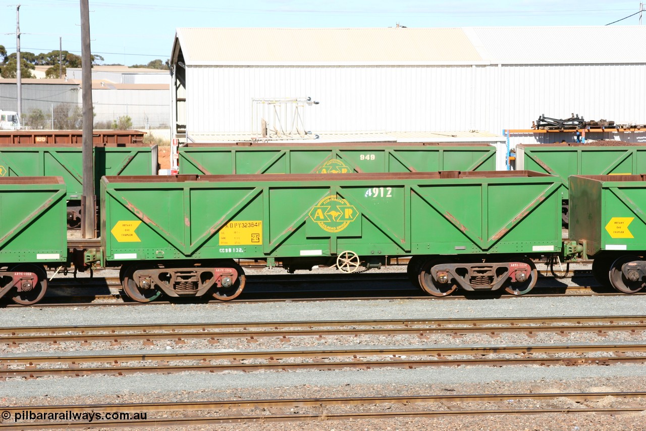 060528 4432
West Kalgoorlie, AOPY 32384 with fleet number 4912, the 4 being a recent addition due to the increasing size of the ore car fleet, one of seventy ex ANR coal waggons rebuilt from AOKF type by Bluebird Engineering SA in service with ARG on Koolyanobbing iron ore trains. They used to be three metres longer and originally built by Metropolitan Cammell Britain as GB type in 1952-55, 28th May 2006.
Keywords: AOPY-type;AOPY32384;Bluebird-Engineering-SA;Metropolitan-Cammell-Britain;GB-type;