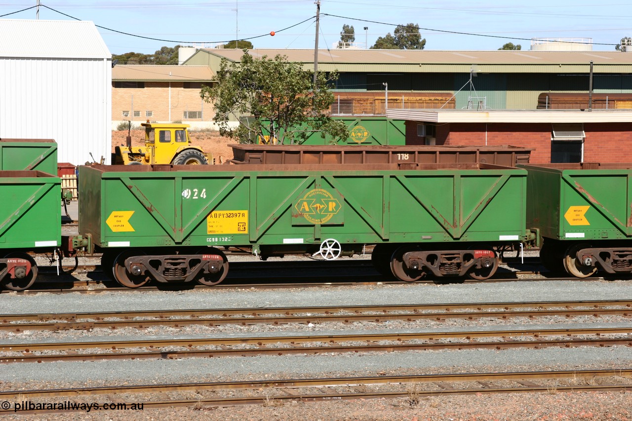 060528 4435
West Kalgoorlie, AOPY 32397, fleet number 4924, with the 4 just squeezed in, one of seventy ex ANR coal waggons rebuilt from AOKF type by Bluebird Engineering SA in service with ARG on Koolyanobbing iron ore trains. They used to be three metres longer and originally built by Metropolitan Cammell Britain as GB type in 1952-55, 28th May 2006.
Keywords: AOPY-type;AOPY32397;Bluebird-Engineering-SA;Metropolitan-Cammell-Britain;GB-type;