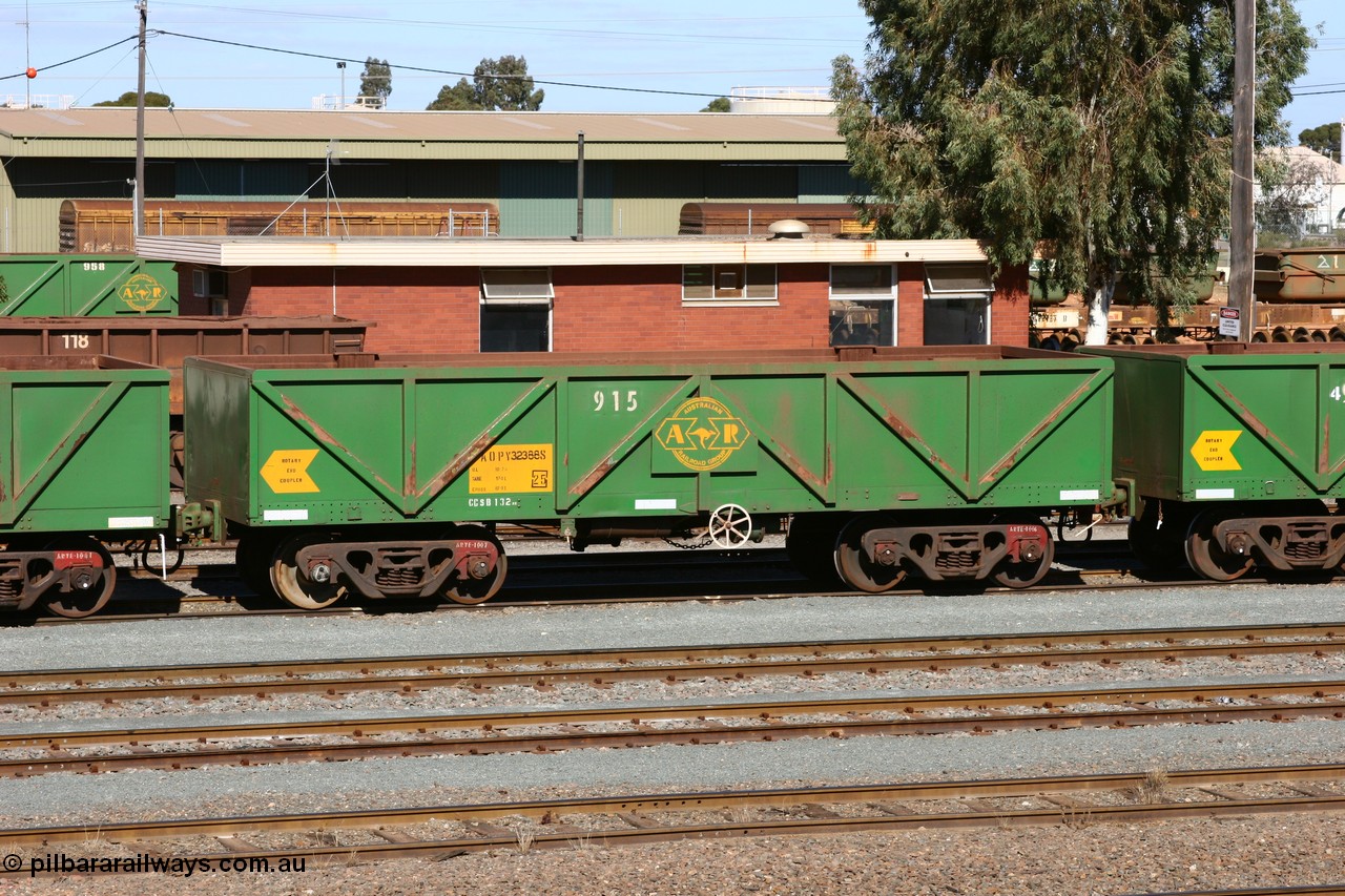 060528 4436
West Kalgoorlie, AOPY 32388, fleet number 915, one of seventy ex ANR coal waggons rebuilt from AOKF type by Bluebird Engineering SA in service with ARG on Koolyanobbing iron ore trains. They used to be three metres longer and originally built by Metropolitan Cammell Britain as GB type in 1952-55, 28th May 2006.
Keywords: AOPY-type;AOPY32388;Bluebird-Engineering-SA;Metropolitan-Cammell-Britain;GB-type;