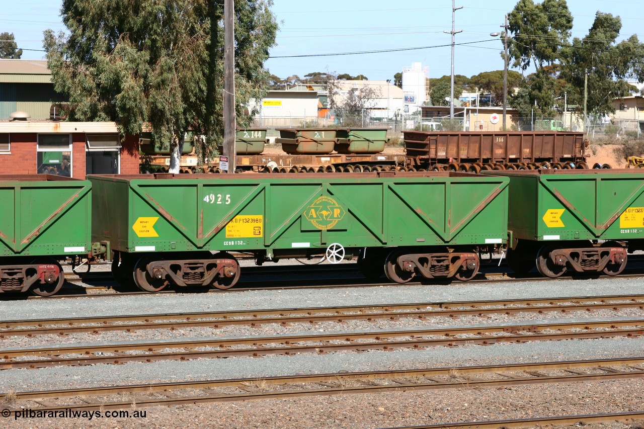060528 4437
West Kalgoorlie, AOPY 32398, fleet number 4925 with an additional 4 added, one of seventy ex ANR coal waggons rebuilt from AOKF type by Bluebird Engineering SA in service with ARG on Koolyanobbing iron ore trains. They used to be three metres longer and originally built by Metropolitan Cammell Britain as GB type in 1952-55, 28th May 2006.
Keywords: AOPY-type;AOPY32398;Bluebird-Engineering-SA;Metropolitan-Cammell-Britain;GB-type;