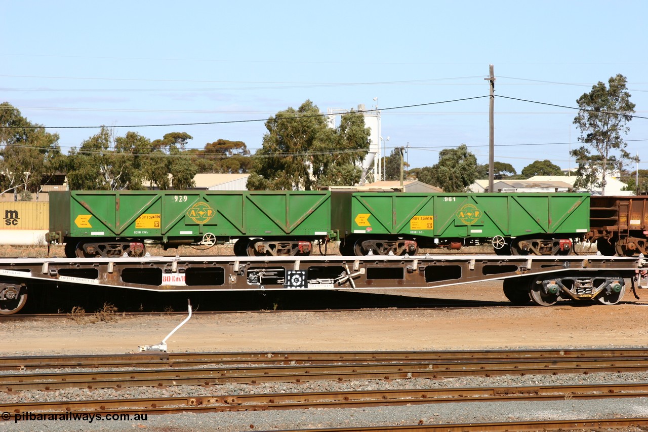 060528 4448
West Kalgoorlie, AOPY waggons 32401, fleet number 929 and 34095 with fleet number 961 and of the drop floor type, two of seventy ex ANR coal waggons rebuilt from AOKF type by Bluebird Engineering SA in service with ARG on Koolyanobbing iron ore trains. They used to be three metres longer and originally built by Metropolitan Cammell Britain as GB type in 1952-55, 28th May 2006.
Keywords: AOPY-type;AOPY32401;AOPY34095;Bluebird-Engineering-SA;Metropolitan-Cammell-Britain;GB-type;