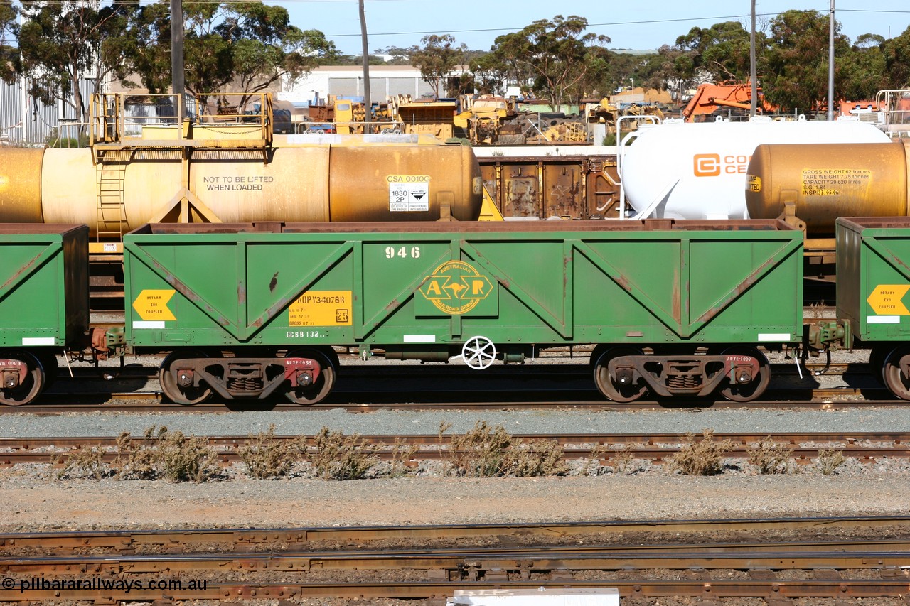 060528 4497
West Kalgoorlie, AOPY 34078 with fleet number 946, one of seventy ex ANR coal waggons rebuilt from AOKF type by Bluebird Engineering SA in service with ARG on Koolyanobbing iron ore trains. They used to be three metres longer and originally built by Metropolitan Cammell Britain as GB type in 1952-55, 28th May 2006.
Keywords: AOPY-type;AOPY34078;Bluebird-Engineering-SA;Metropolitan-Cammell-Britain;GB-type;