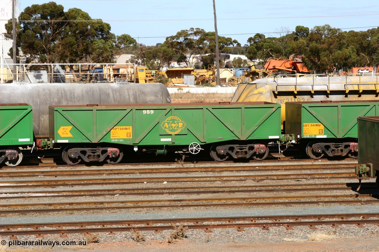 060528 4502
West Kalgoorlie, AOPY 34090 with fleet number 959 and of the drop floor type, one of seventy ex ANR coal waggons rebuilt from AOKF type by Bluebird Engineering SA in service with ARG on Koolyanobbing iron ore trains. They used to be three metres longer and originally built by Metropolitan Cammell Britain as GB type in 1952-55, 28th May 2006.
Keywords: AOPY-type;AOPY34090;Bluebird-Engineering-SA;Metropolitan-Cammell-Britain;GB-type;