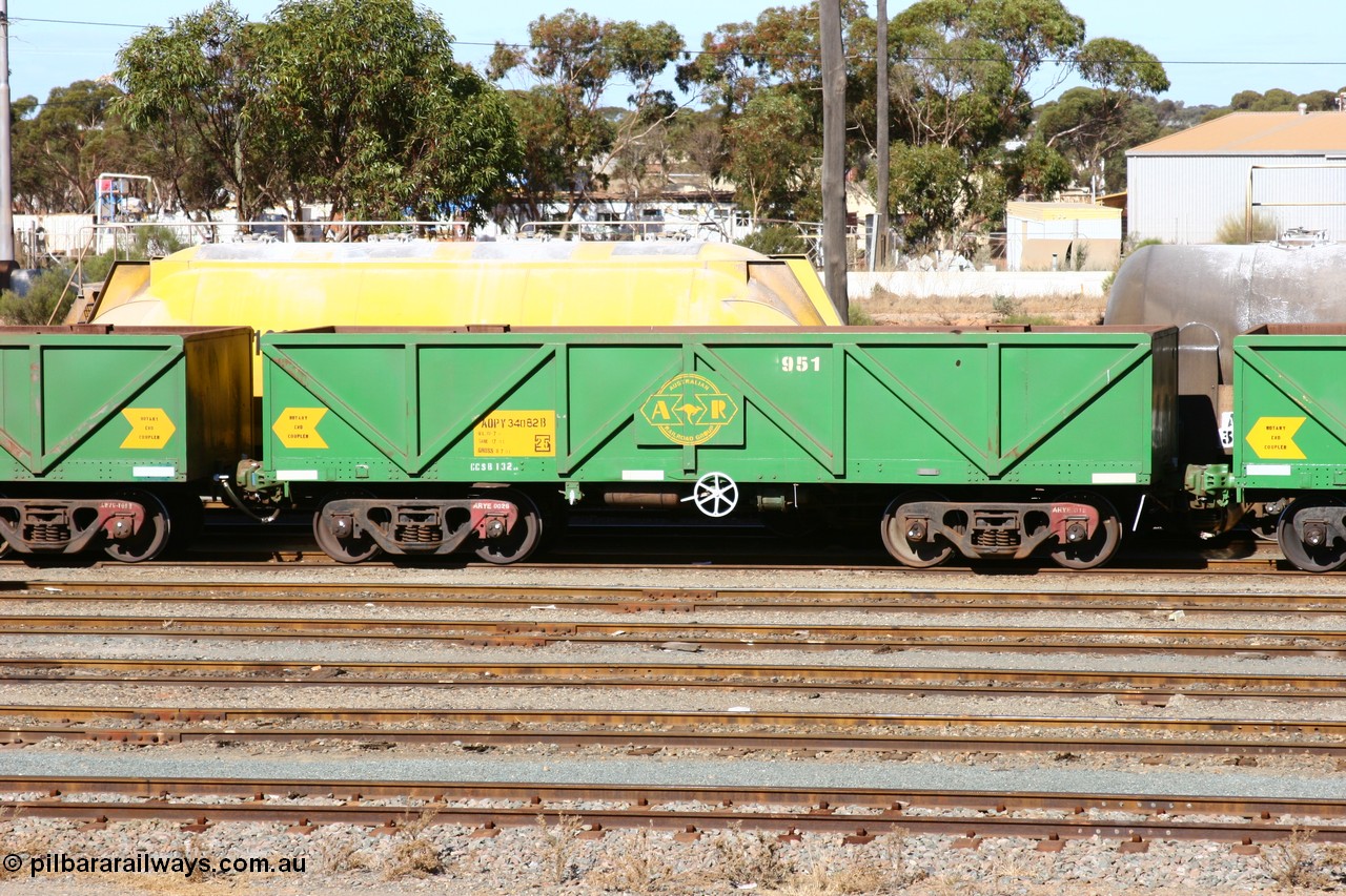 060528 4505
West Kalgoorlie, AOPY 34082, fleet number 951, one of seventy ex ANR coal waggons rebuilt from AOKF type by Bluebird Engineering SA in service with ARG on Koolyanobbing iron ore trains. They used to be three metres longer and originally built by Metropolitan Cammell Britain as GB type in 1952-55, 28th May 2006.
Keywords: AOPY-type;AOPY34082;Bluebird-Engineering-SA;Metropolitan-Cammell-Britain;GB-type;