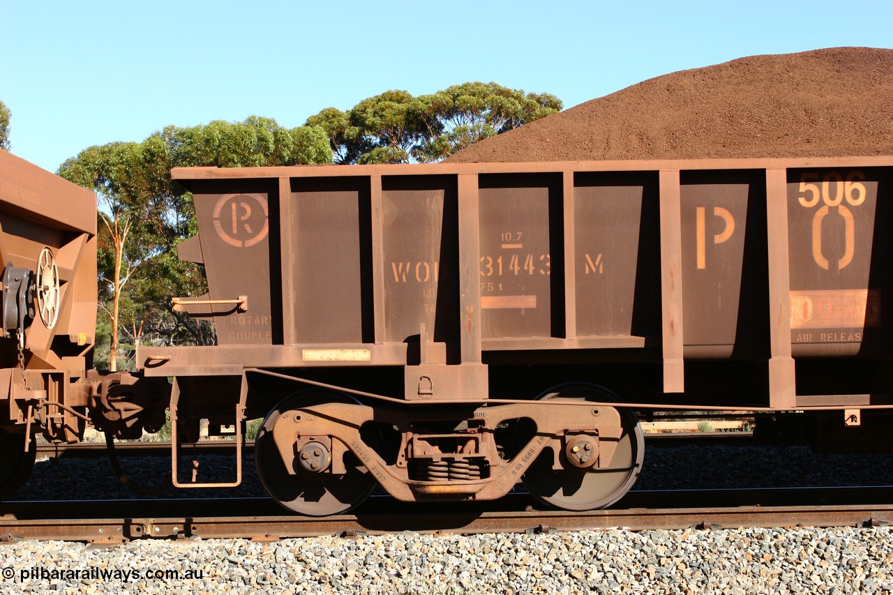 060528 4559
WOD type iron ore waggon WOD 31443 is one of a batch of sixty two built by Goninan WA between April and August 2000 with serial number 950086-016 and fleet number 506 for Koolyanobbing iron ore operations, build date 05/2000, with a 75 ton capacity, for Portman Mining to cart their Koolyanobbing iron ore to Esperance. Seen here loaded with fines in train 413 at Bonnie Vale. 28th May 2006.
Keywords: WOD-type;WOD31443;Goninan-WA;950086-016;