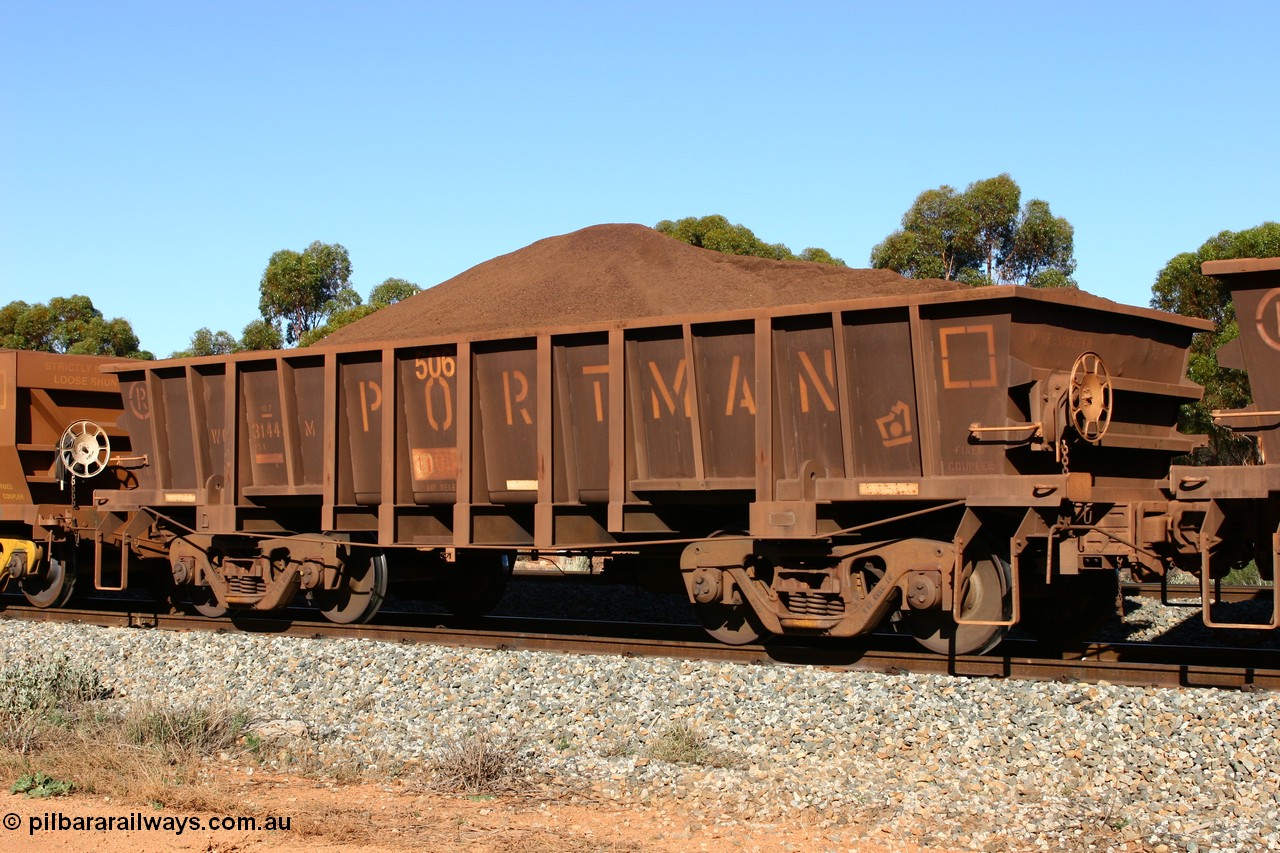 060528 4560
WOD type iron ore waggon WOD 31443 is one of a batch of sixty two built by Goninan WA between April and August 2000 with serial number 950086-016 and fleet number 506 for Koolyanobbing iron ore operations, build date 05/2000, with a 75 ton capacity, for Portman Mining to cart their Koolyanobbing iron ore to Esperance. Seen here loaded with fines in train 413 at Bonnie Vale. 28th May 2006.
Keywords: WOD-type;WOD31443;Goninan-WA;950086-015;