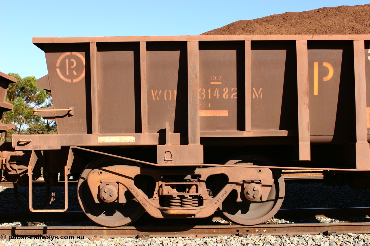 060528 4562
WOD type iron ore waggon WOD 31482 is one of a batch of sixty two built by Goninan WA between April and August 2000 with serial number 950086-054 and fleet number 545 for Koolyanobbing iron ore operations with a 75 ton capacity build date 07/2000, for Portman Mining to cart their Koolyanobbing iron ore to Esperance. Seen here loaded with fines in train 413 at Bonnie Vale. 28th May 2006.
Keywords: WOD-type;WOD31482;Goninan-WA;950086-054;