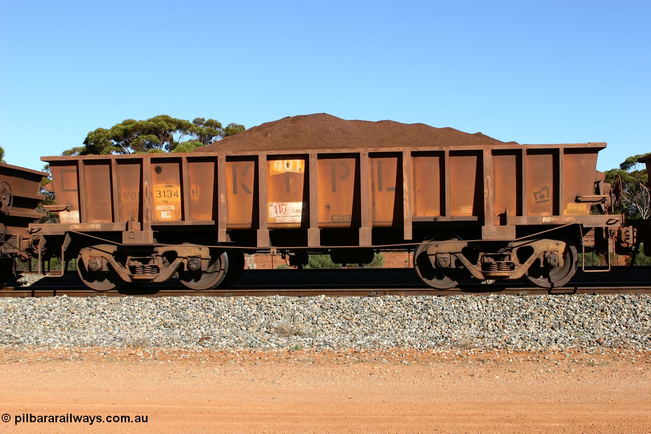 060528 4568
WOC type iron ore waggon WOC 31341 is leader of a batch of thirty built by Goninan WA between October 1997 to January 1998 with fleet number 401 for Koolyanobbing iron ore operations with a 75 ton capacity and lettered for KIPL, Koolyanobbing Iron Pty Ltd, seen here loaded with fines ore at Bonnie Vale in train number 413, 28th May 2006.
Keywords: WOC-type;WOC31341;Goninan-WA;