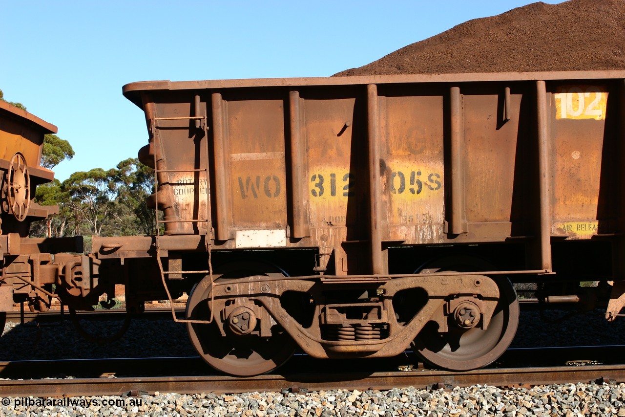 060528 4569
WO type iron ore waggon WO 31205 is one of a batch of eighty six built by WAGR Midland Workshops between 1967 and March 1968 with fleet number 102 for Koolyanobbing iron ore operations, with a 75 ton and 1018 ft.³ capacity, seen here loaded with fines at Bonnie Vale, 28th May 2006. This unit was converted to WOS superphosphate in the late 1980s till 1994 when it was re-classed back to WO.
Keywords: WO-type;WO31205;WAGR-Midland-WS;WOS-type;