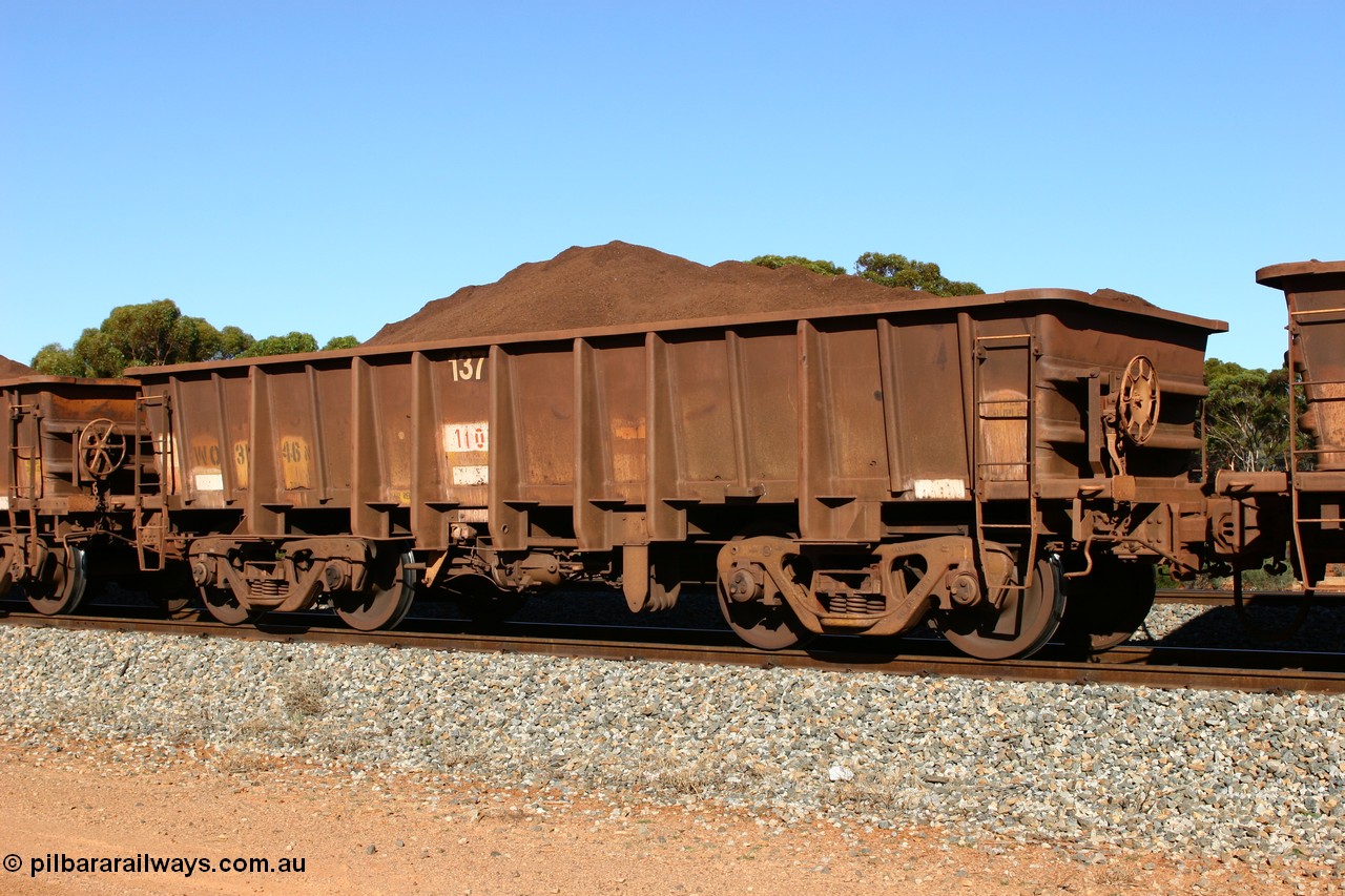 060528 4572
WO type iron ore waggon WO 31246 is one of a batch of eighty six built by WAGR Midland Workshops between 1967 and March 1968 with fleet number 137 for Koolyanobbing iron ore operations, with a 75 ton and 1018 ft³ capacity, seen here loaded with fines ore at Bonnie Vale, 28th May 2006. This unit was converted to WOC for coal in 1986 till 1994 when it was re-classed back to WO.
Keywords: WO-type;WO31246;WAGR-Midland-WS;