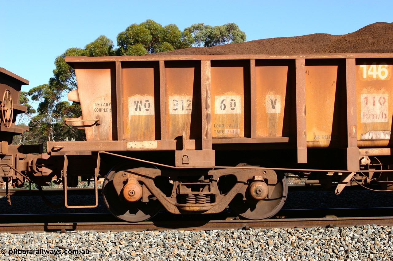 060528 4573
WO type iron ore waggon WO 31260 is one of a batch of sixty two built by Goninan WA between April and August 2000 with serial number 950086-010 and fleet number 146 for Koolyanobbing iron ore operations, and is a Goninan built replacement WO type waggon that replaces the original WAGR built WO type waggon with the newer style WOD type and has square features opposed to the curved ones as on the original WO class. Bonnie Vale, 28th May 2006.
Keywords: WO-type;WO31260;Goninan-WA;950086-010;