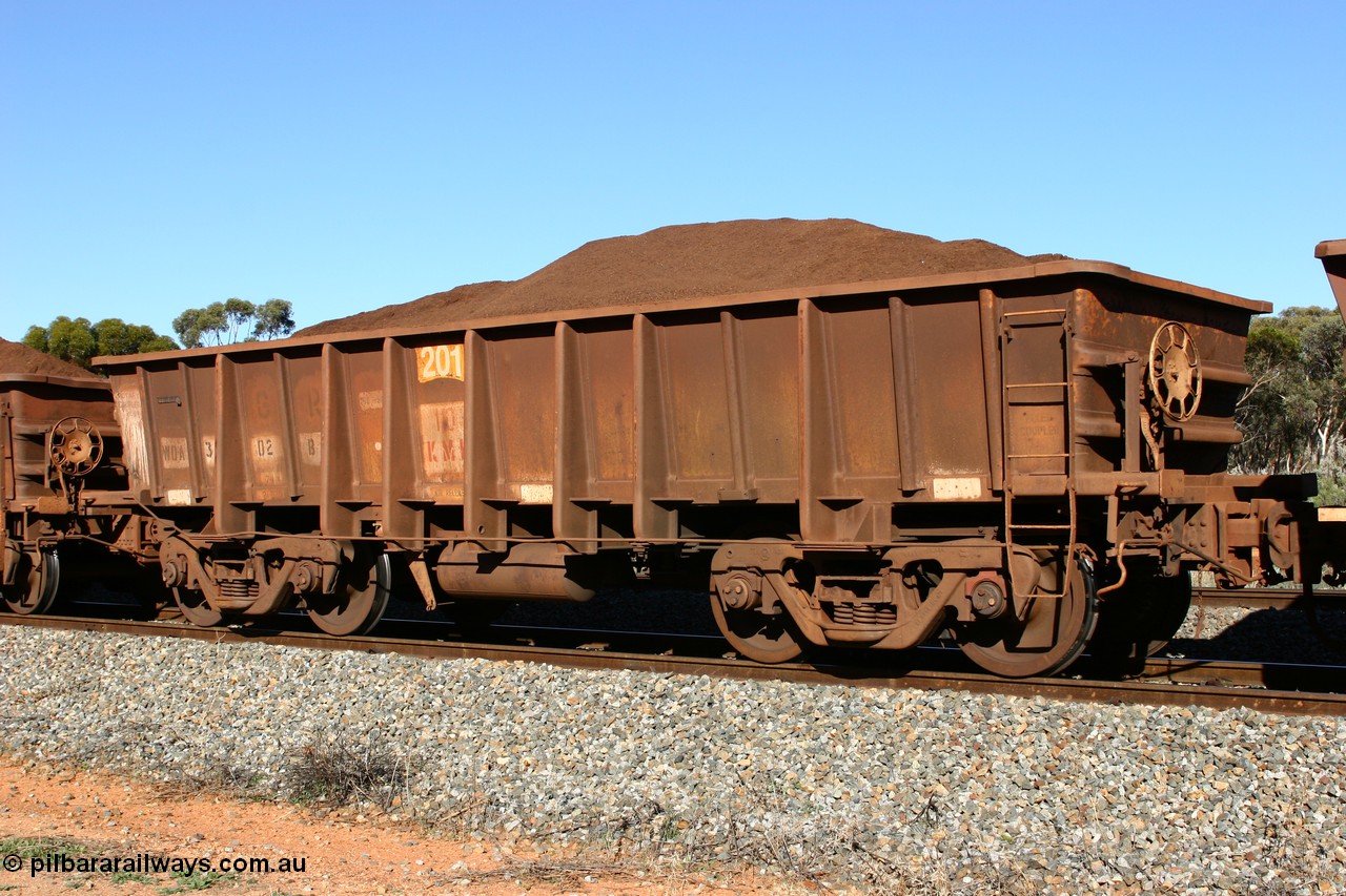 060528 4580
WOA type iron ore waggon WOA 31302 is leader of a batch of thirty nine built by WAGR Midland Workshops between 1970 and 1971 with fleet number 201 for Koolyanobbing iron ore operations, with a 75 ton and 1018 ft³ capacity, seen here with fines ore at Bonnie Vale, 28th May 2006.
Keywords: WOA-type;WOA31302;WAGR-Midland-WS;type-leader;