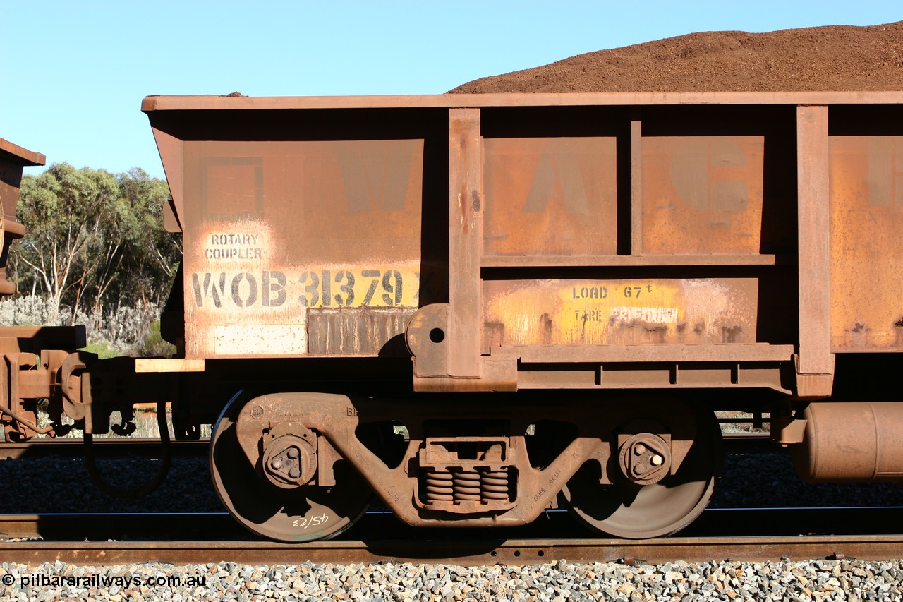 060528 4581
WOB type iron ore waggon WOB 31379 is one of a batch of twenty five built by Comeng WA between 1974 and 1975 and converted from Mt Newman high sided waggons by WAGR Midland Workshops with a capacity of 67 tons with fleet number 304 for Koolyanobbing iron ore operations, seen here at Bonnie Vale loaded with fines, 28th May 2006.
Keywords: WOB-type;WOB31379;Comeng-WA;Mt-Newman-Mining;