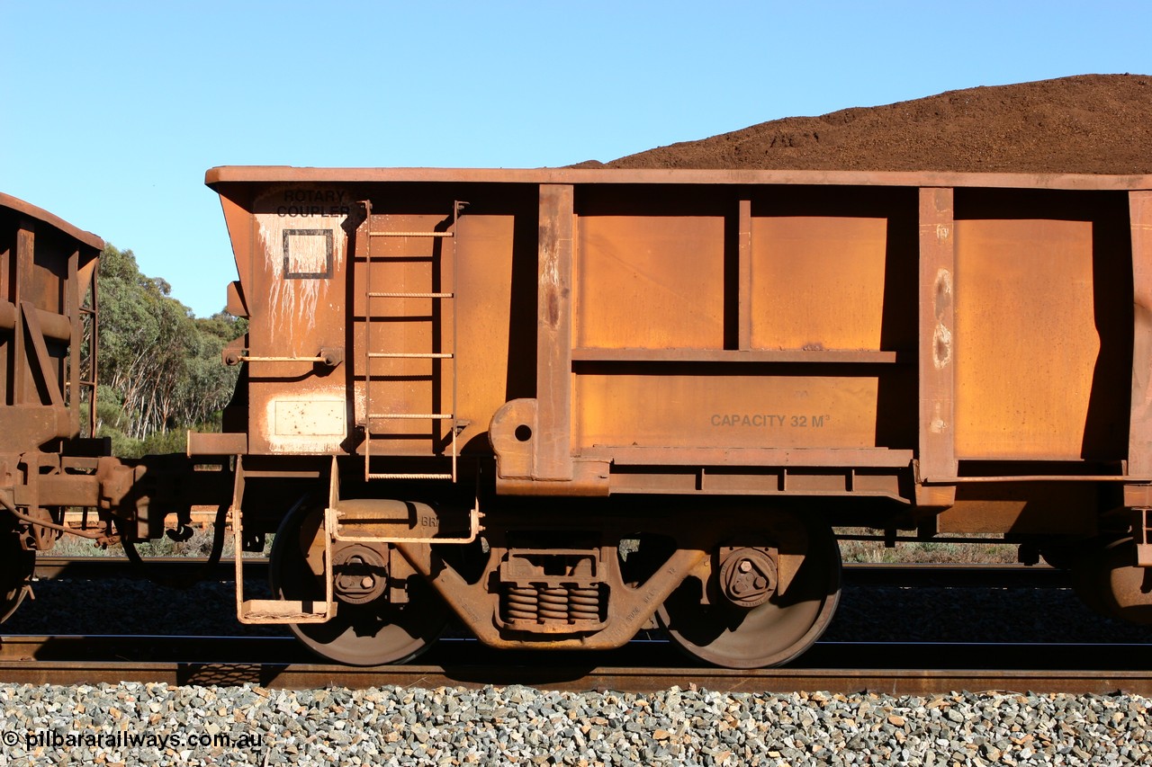 060528 4583
WOB type iron ore waggon WOB 31392 is one of a batch of twenty five built by Comeng WA between 1974 and 1975 and converted from Mt Newman high sided waggons by WAGR Midland Workshops with a capacity of 67 tons with fleet number 317 for Koolyanobbing iron ore operations, this waggon was converted to a WSM ballast hopper, then converted back to a WOB by WAGR Midland Workshops, and started life as a Comeng built Mt Newman Mining ore waggon in 1974. It was originally numbered 31391 by WAGR, seen here loaded with fines at Bonnie Vale, 28th May 2006.
Keywords: WOB-type;WOB31392;Comeng-WA;WSM-type;Mt-Newman-Mining;