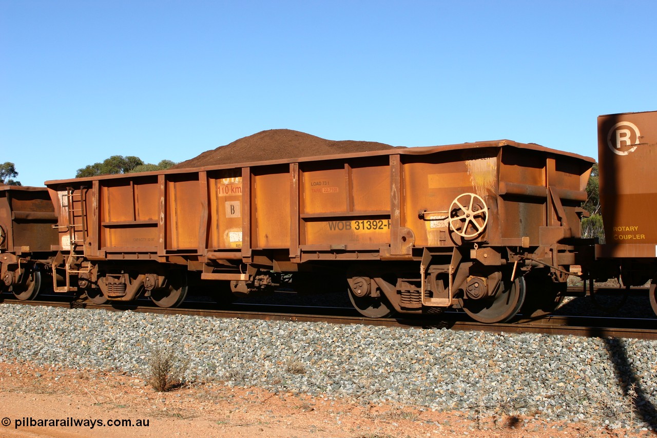 060528 4584
WOB type iron ore waggon WOB 31392 is one of a batch of twenty five built by Comeng WA between 1974 and 1975 and converted from Mt Newman high sided waggons by WAGR Midland Workshops with a capacity of 67 tons with fleet number 317 for Koolyanobbing iron ore operations, then the top section re-fitted and converted to a WSM ballast hopper, then converted back to a WOB by WAGR Midland Workshops. It was originally numbered 31391 by WAGR, seen here loaded with fines at Bonnie Vale, 28th May 2006.
Keywords: WOB-type;WOB31392;Comeng-WA;WSM-type;Mt-Newman-Mining;