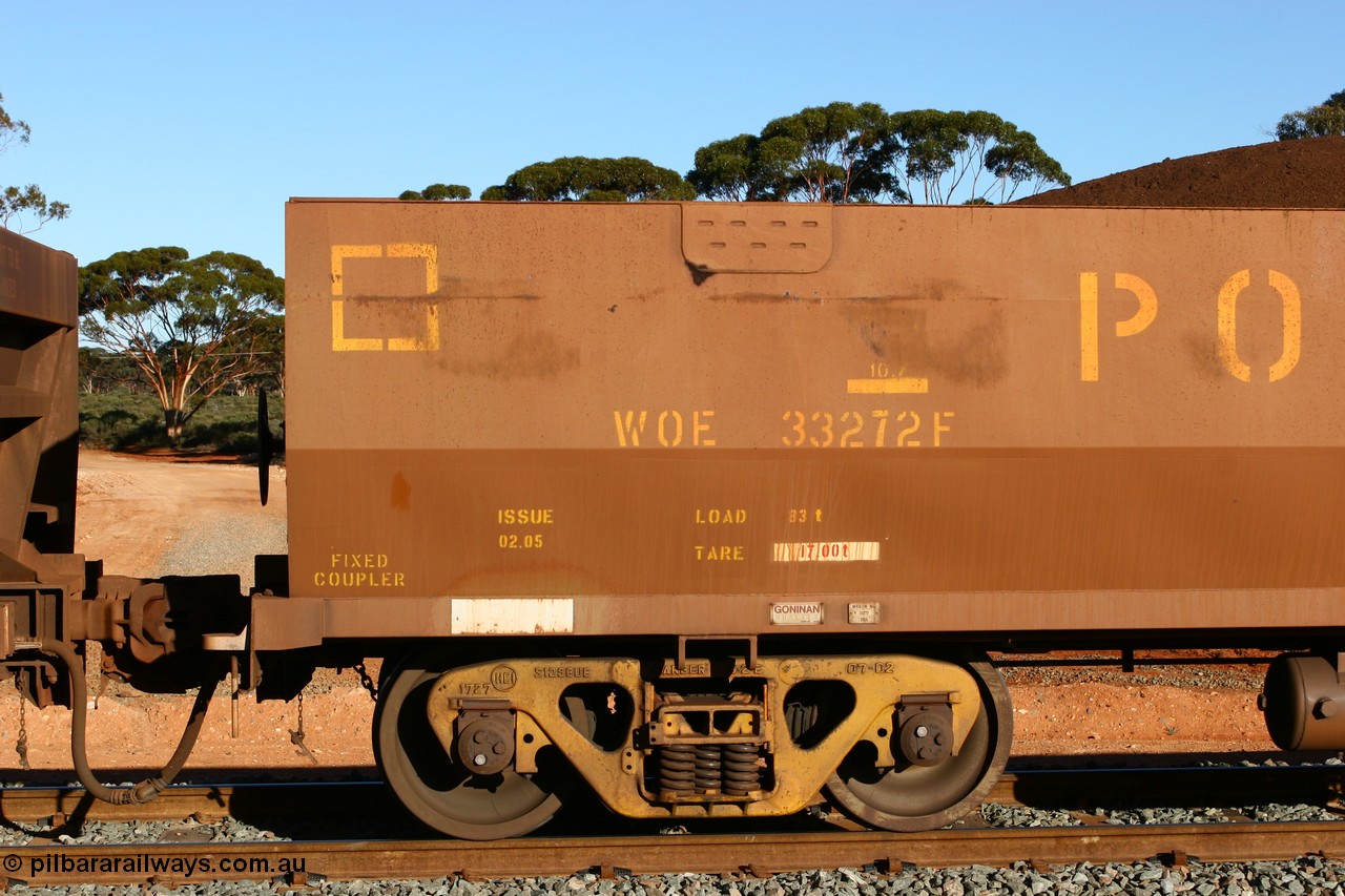 060528 4620
WOE type iron ore waggon WOE 33272 is one of a batch of thirty five built by Goninan WA between January and April 2005 with serial number 950104-012 and fleet number 771 for Koolyanobbing iron ore operations, number board view, shows builders plate, load, tare, length and issue date, build date 02/2005, current style of 83 tonne load capacity built for Portman Mining, at Binduli, 28th May 2006.
Keywords: WOE-type;WOE33272;Goninan-WA;950104-012;