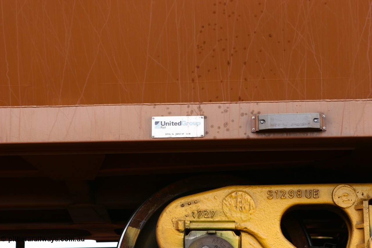 060529 4701
WOE type iron ore waggon WOE 33432 is one of a batch of one hundred and forty one built by United Group Rail WA between November 2005 and April 2006 with serial number 950142-137 and fleet number 8931 for Koolyanobbing iron ore operations, Amtech AEI tag and builders plate, 83 ton capacity and build date of 04/2006 for Portman Mining, Binduli 29th May 2006.
Keywords: WOE-type;WOE33432;United-Group-Rail-WA;950142-137;