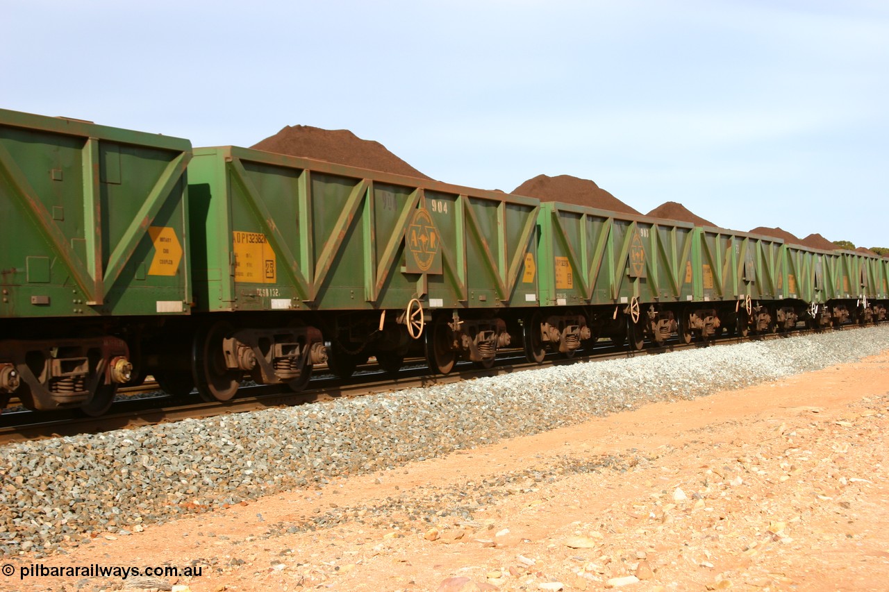 060531 5003
Binduli, AOPY 32382, with fleet number 904, one of seventy ex ANR coal waggons rebuilt from AOKF type by Bluebird Engineering SA in service with ARG on Koolyanobbing iron ore trains. They used to be three metres longer and originally built by Metropolitan Cammell Britain as GB type in 1952-55, seen here in the consist with sister waggons of a loaded train bound for West Kalgoorlie, 31st May 2006.
Keywords: AOPY-type;AOPY32382;Bluebird-Engineering-SA;Metropolitan-Cammell-Britain;GB-type;
