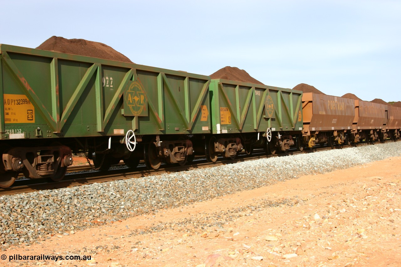 060531 5008
Binduli, AOPY 32399, fleet number 922, one of seventy ex ANR coal waggons rebuilt from AOKF type by Bluebird Engineering SA in service with ARG on Koolyanobbing iron ore trains. They used to be three metres longer and originally built by Metropolitan Cammell Britain as GB type in 1952-55, seen here in the consist with sister waggons of a loaded train bound for West Kalgoorlie, 31st May 2006.
Keywords: AOPY-type;AOPY32399;Bluebird-Engineering-SA;Metropolitan-Cammell-Britain;GB-type;