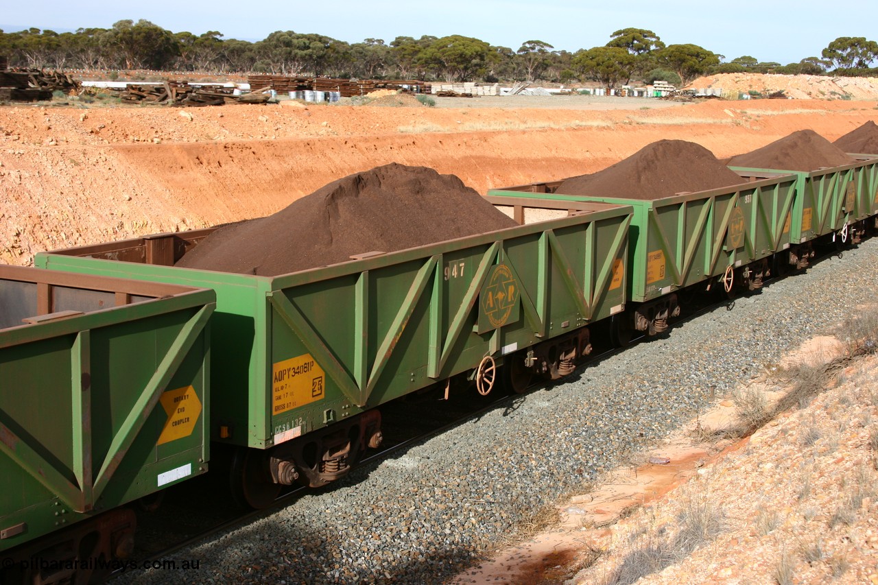 060531 5023
West Kalgoorlie, AOPY 34081 with fleet number 947, one of seventy ex ANR coal waggons rebuilt from AOKF type by Bluebird Engineering SA in service with ARG on Koolyanobbing iron ore trains. They used to be three metres longer and originally built by Metropolitan Cammell Britain as GB type in 1952-55, 31st May 2006.
Keywords: AOPY-type;AOPY34081;Bluebird-Engineering-SA;Metropolitan-Cammell-Britain;GB-type;
