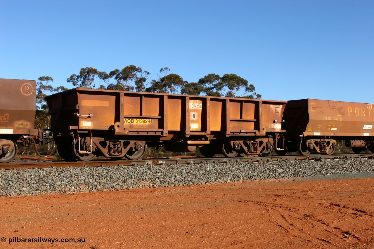 070531 9727
WOB type iron ore waggon WOB 31392 is one of a batch of twenty five built by Comeng WA between 1974 and 1975 and converted from Mt Newman high sided waggons by WAGR Midland Workshops with fleet number 317 for Koolyanobbing iron ore operations, shows the higher tare of these waggons and the capacity of 73 tons, waggon length of 10.8 metres, and a close inspection reveals that the round WAGR waggon builder's number is 31391 of 1974, this waggon cut down originally from a Comeng built Mt Newman Mining ore waggon in 1974. It was then converted to a WSM ballast hopper, then converted back to a WOB by WAGR Midland Workshops. It was originally numbered 31391 by WAGR, seen here at Binduli on an empty train, 31st May 2007.
Keywords: WOB-type;WOB31392;Comeng-WA;WSM-type;Mt-Newman-Mining;