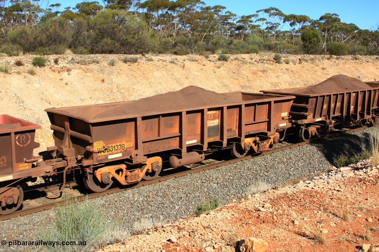 100602 8543
WOB type iron ore waggon WOB 31378 is one of a batch of twenty five built by Comeng WA between 1974 and 1975 and converted from Mt Newman high sided waggons by WAGR Midland Workshops with a capacity of 67 tons with fleet number 303 for Koolyanobbing iron ore operations, seen here west of Binduli, 2nd June 2010.
Keywords: WOB-type;WOB31378;Comeng-WA;Mt-Newman-Mining;