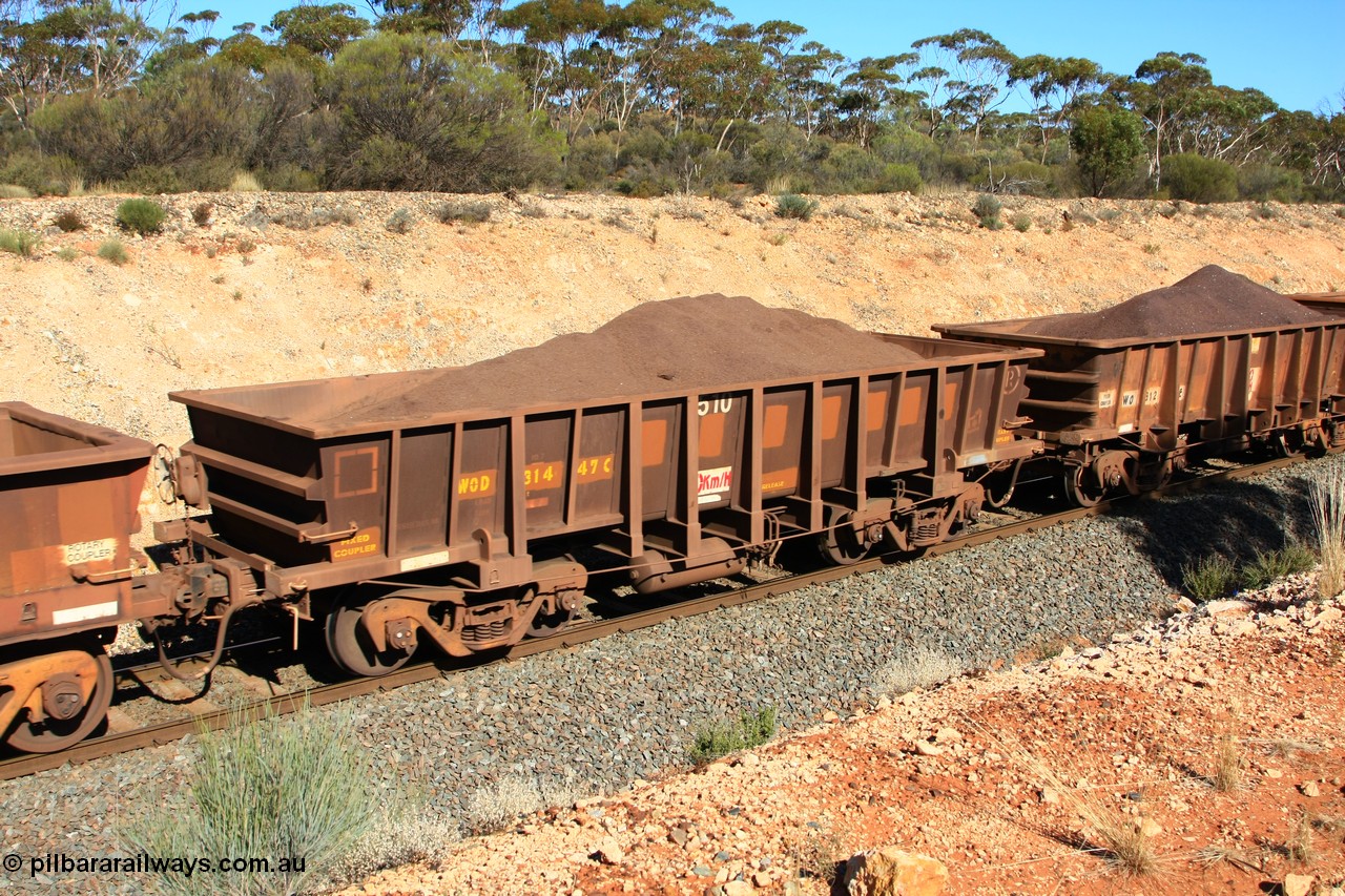 100602 8544
WOD type iron ore waggon WOD 31447 is one of a batch of sixty two built by Goninan WA between April and August 2000 with serial number 950086-019 and fleet number 510 for Koolyanobbing iron ore operations with a 75 ton capacity and a build date of 05/2000, for Portman Mining to cart their Koolyanobbing iron ore to Esperance, with the letters now painted over, loaded with fines ore just west of Binduli, 2nd June 2010.
Keywords: WOD-type;WOD31447;Goninan-WA;950086-019;