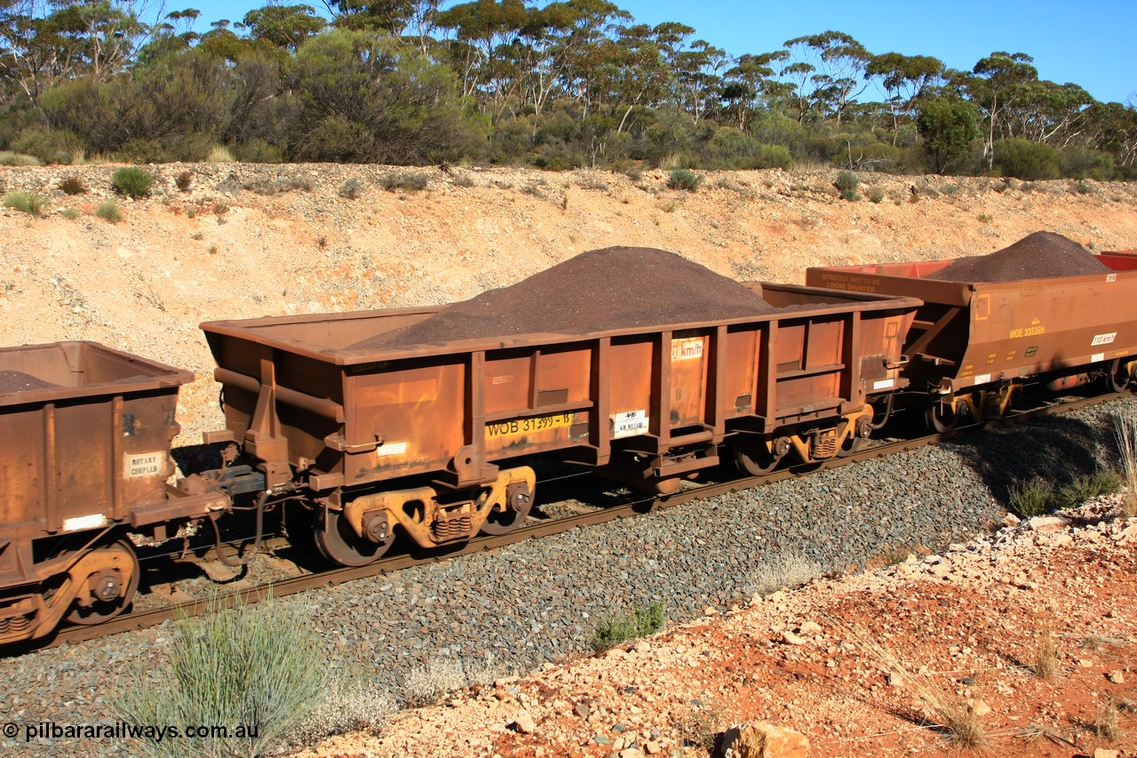 100602 8546
WOB type iron ore waggon WOB 31399 is one of a batch of twenty five built by Comeng WA between 1974 and 1975 and converted from Mt Newman high sided waggons by WAGR Midland Workshops with a capacity of 67 tons with fleet number 323 for Koolyanobbing iron ore operations, seen here west of Binduli 2nd June 2010.
Keywords: WOB-type;WOB31399;Comeng-WA;WSM-type;Mt-Newman-Mining;