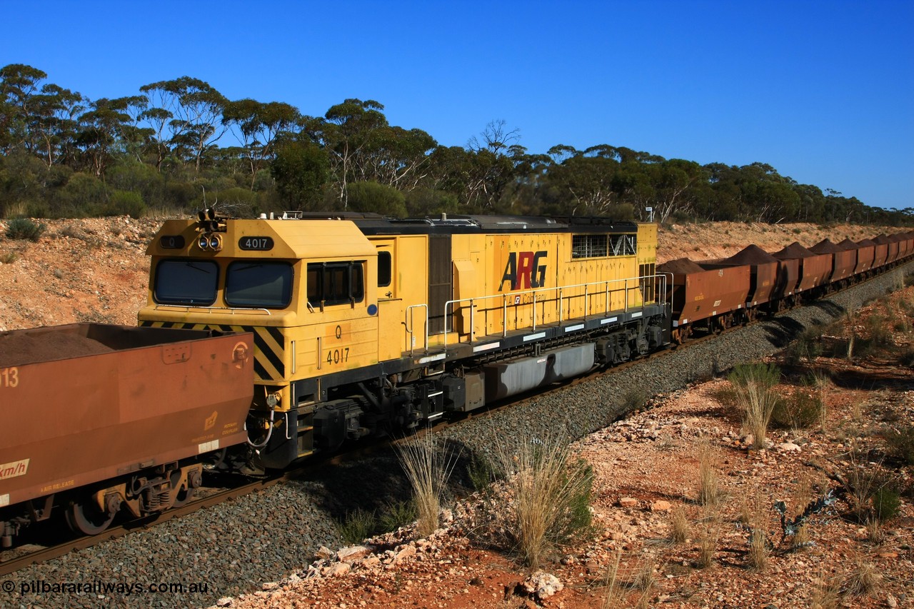 100602 8571
Binduli, standard gauge former Westrail Q class locomotive Q 4017 Clyde Engineering EMD model GT46C serial 98-1470, seen here in mid-train service as the DPU unit on an Esperance bound loaded Koolyanobbing iron ore train in amongst WOE type iron ore waggons, 2nd June 2010.
Keywords: Q-class;Q4017;Clyde-Engineering-Forrestfield-WA;EMD;GT46C;98-1470;Q317;