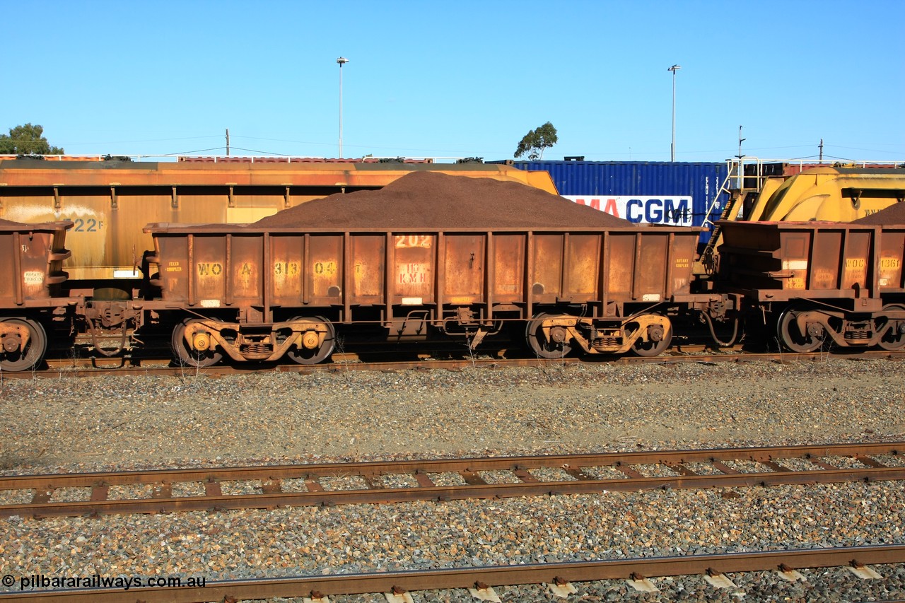 100602 8689
WOA type iron ore waggon WOA 31304 is one of a batch of thirty nine built by WAGR Midland Workshops between 1970 and 1971 with fleet number 202 for Koolyanobbing iron ore operations, with a 75 ton and 1018 ft³ capacity, West Kalgoorlie loaded with fines, 2nd June 2010.
Keywords: WOA-type;WOA31304;WAGR-Midland-WS;