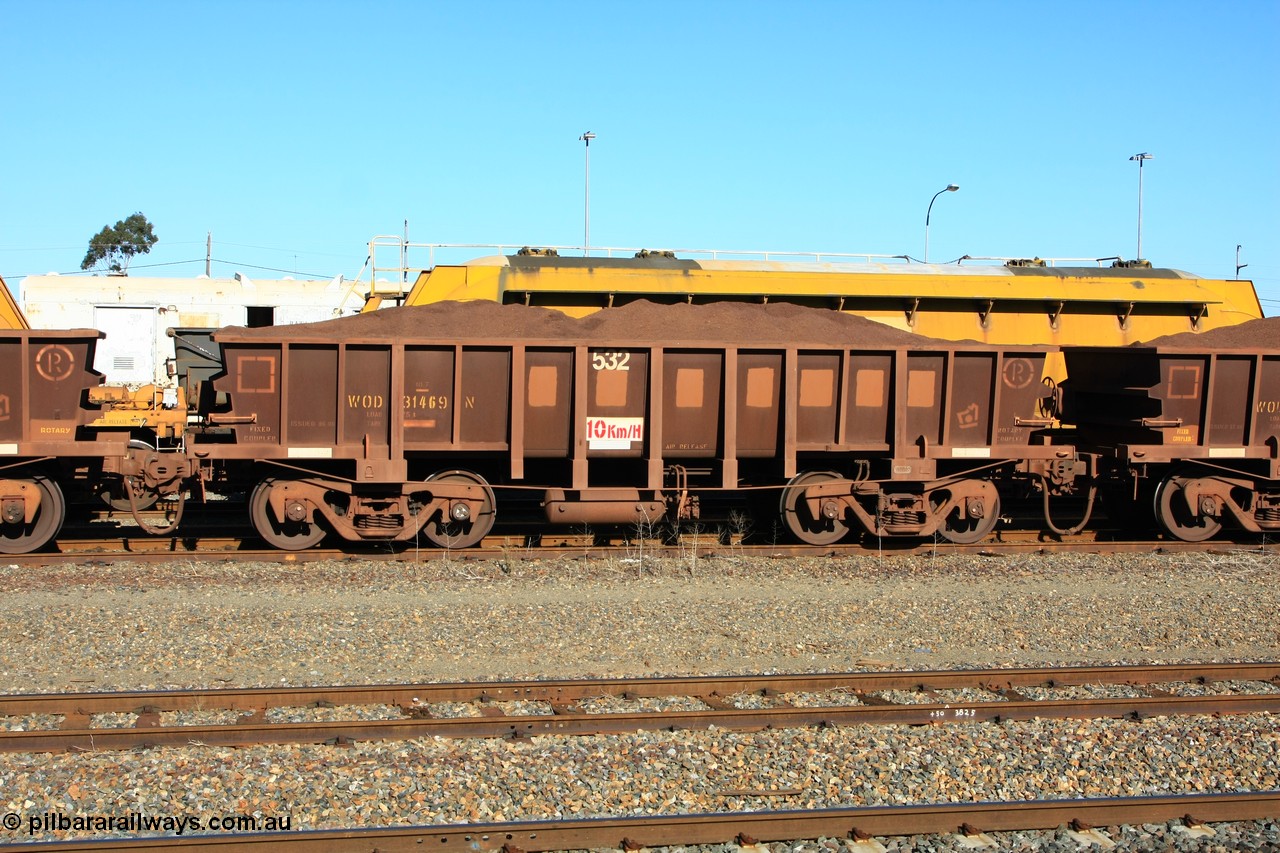 100602 8695
WOD type iron ore waggon WOD 31469 is one of a batch of sixty two built by Goninan WA between April and August 2000 with serial number 950086-041 and fleet number 532 for Koolyanobbing iron ore operations with a 75 ton capacity and build date 06/2000, for Portman Mining to cart their Koolyanobbing iron ore to Esperance, with the letters now painted over, loaded with fines ore, West Kalgoorlie 2nd June 2010.
Keywords: WOD-type;WOD31469;Goninan-WA;950086-041;