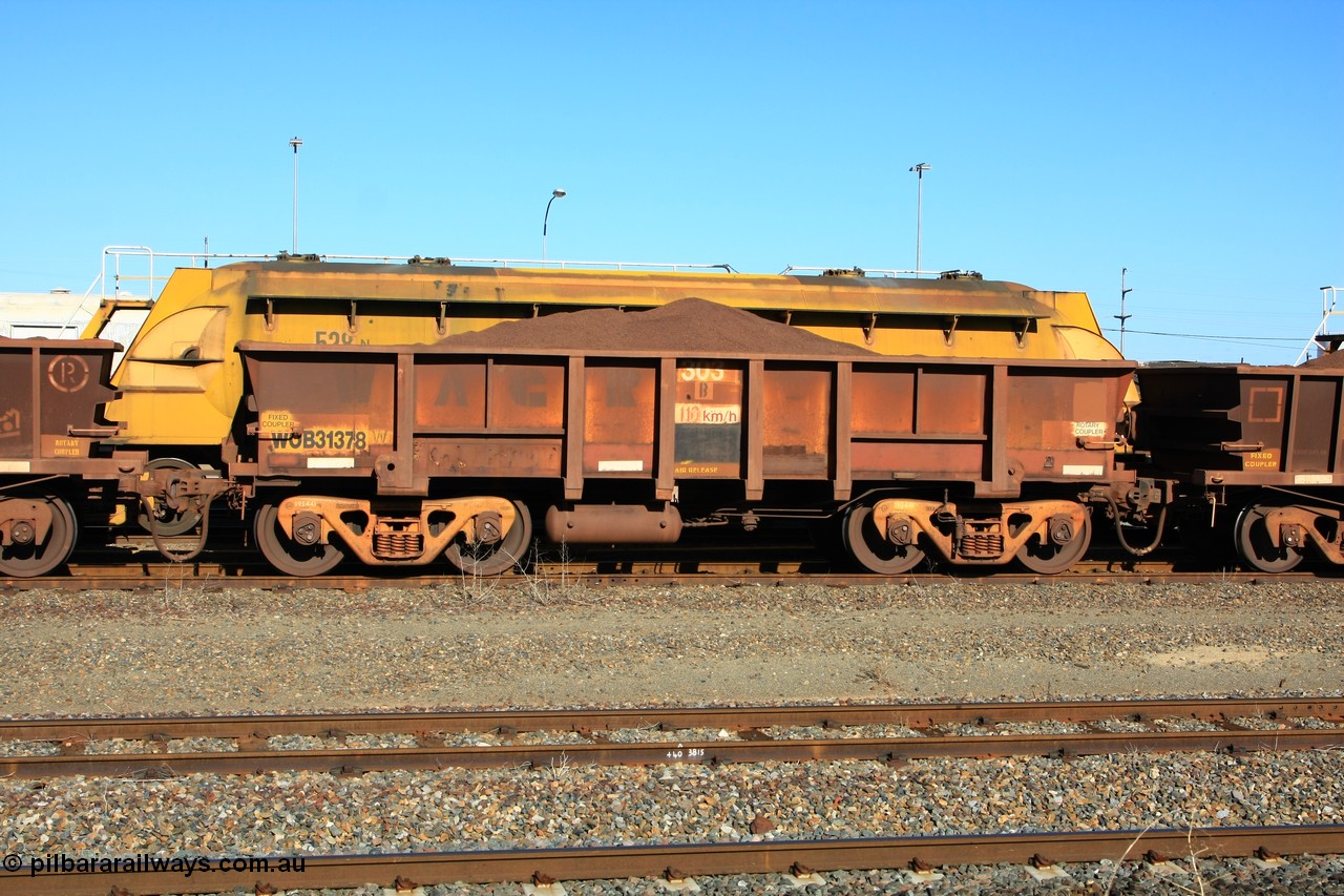 100602 8697
WOB type iron ore waggon WOB 31378 is one of a batch of twenty five built by Comeng WA between 1974 and 1975 and converted from Mt Newman high sided waggons by WAGR Midland Workshops with a capacity of 67 tons with fleet number 303 for Koolyanobbing iron ore operations, loaded with fines, West Kalgoorlie 2nd June 2010.
Keywords: WOB-type;WOB31378;Comeng-WA;Mt-Newman-Mining;