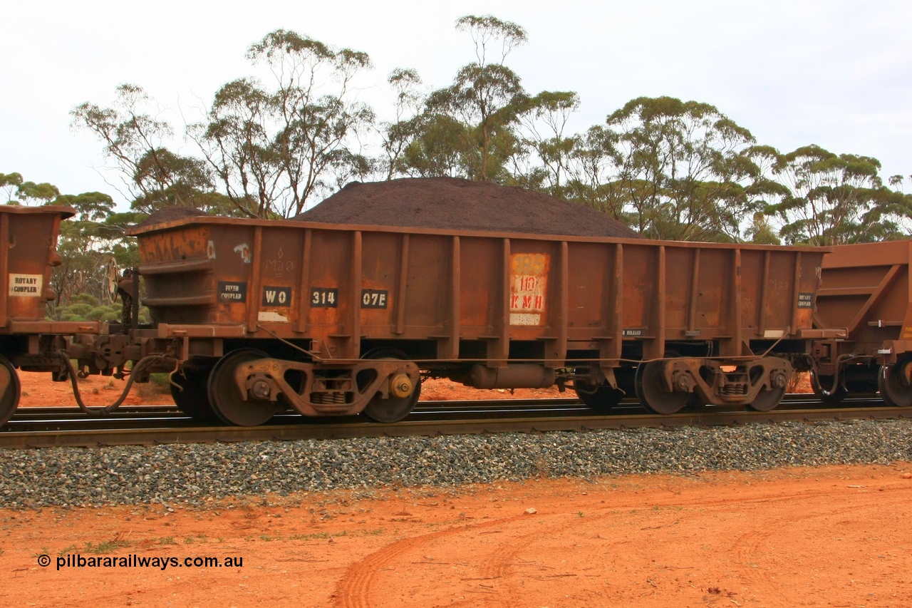 100605 9327
WO type iron ore waggon WO 31407 is one of a batch of eleven replacement waggons built by WAGR Midland Workshops between 1970 and 1971 with fleet number 185 for Koolyanobbing iron ore operations, with a 75 ton and 1018 ft³ capacity. This unit was converted to WOC for coal in 1986 till 1994 when it was re-classed back to WO, Binduli Triangle, loaded with fines, 5th June 2010.
Keywords: WO-type;WO31407;WAGR-Midland-WS;