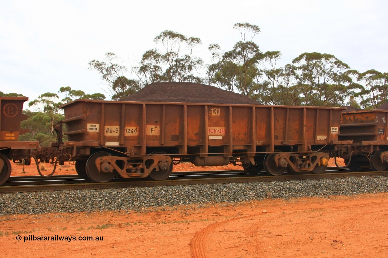 100605 9328
WO type iron ore waggon WO 31240 is one of a batch of eighty six built by WAGR Midland Workshops between 1967 and March 1968 with fleet number 131 for Koolyanobbing iron ore operations, with a 75 ton and 1018 ft³ capacity, Binduli Triangle, loaded with fines, 5th June 2010. This unit was converted to WOC for coal in 1986 till 1994 when it was re-classed back to WO.
Keywords: WO-type;WO31240;WAGR-Midland-WS;