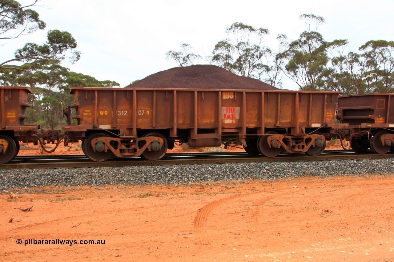 100605 9332
WO type iron ore waggon WO 31207 is one of a batch of eighty six built by WAGR Midland Workshops between 1967 and March 1968 with fleet number 103 for Koolyanobbing iron ore operations, with a 75 ton and 1018 ft.³ capacity, Binduli Triangle, loaded with fines, 5th June 2010. This unit was converted to WOS superphosphate in the late 1980s till 1994 when it was re-classed back to WO.
Keywords: WO-type;WO31207;WAGR-Midland-WS;WOS-type;