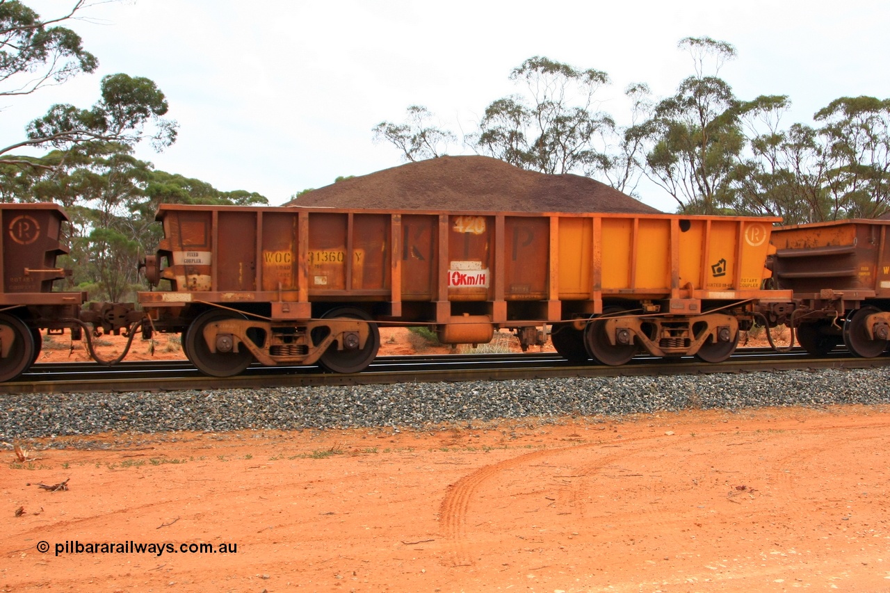 100605 9334
WOC type iron ore waggon WOC 31360 is one of a batch of thirty built by Goninan WA between October 1997 to January 1998 with fleet number 420 for Koolyanobbing iron ore operations with a 75 ton capacity and lettered for KIPL, Koolyanobbing Iron Pty Ltd, with the non-handbrake end repainted, seen here loaded with fines ore, Binduli, 5th June 2010.
Keywords: WOC-type;WOC31360;Goninan-WA;