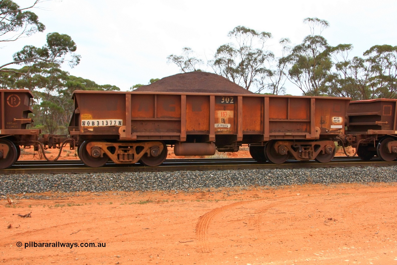 100605 9337
WOB type iron ore waggon WOB 31377 is one of a batch of twenty five built by Comeng WA between 1974 and 1975 and converted from Mt Newman high sided waggons by WAGR Midland Workshops with a capacity of 67 tons with fleet number 302 for Koolyanobbing iron ore operations, loaded with fines, West Kalgoorlie 2nd June 2010.
Keywords: WOB-type;WOB31377;Comeng-WA;Mt-Newman-Mining;