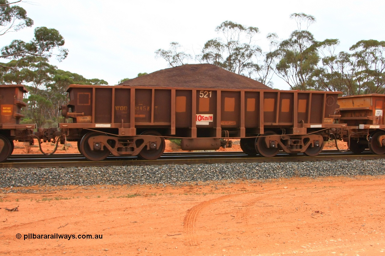 100605 9348
WOD type iron ore waggon WOD 31458 is one of a batch of sixty two built by Goninan WA between April and August 2000 with serial number 950086-030 and fleet number 521 for Koolyanobbing iron ore operations with a 75 ton capacity for Portman Mining to cart their Koolyanobbing iron ore to Esperance, now with PORTMAN painted out, Binduli Triangle, loaded with fines, 5th June 2010.
Keywords: WOD-type;WOD31458;Goninan-WA;950086-030;