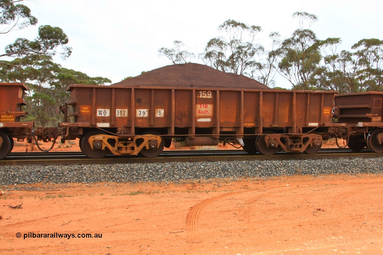 100605 9349
WO type iron ore waggon WO 31279 is one of a batch of eighty six built by WAGR Midland Workshops between 1967 and March 1968 with fleet number 159 for Koolyanobbing iron ore operations, with a 75 ton and 1018 ft³ capacity, Binduli Triangle, loaded with fines, 5th June 2010. This unit was converted to WOC for coal in 1986 till 1994 when it was re-classed back to WO.
Keywords: WO-type;WO31279;WAGR-Midland-WS;