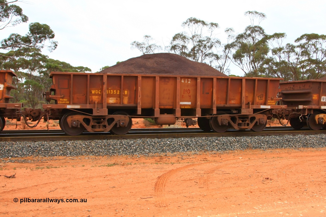 100605 9350
WOC type iron ore waggon WOC 31352 is one of a batch of thirty built by Goninan WA between October 1997 to January 1998 with fleet number 412 for Koolyanobbing iron ore operations with a 75 ton capacity and lettered for KIPL, Koolyanobbing Iron Pty Ltd with repainting of the middle panels leaving only the L visible, Binduli Triangle, loaded with fines, 5th June 2010.
Keywords: WOC-type;WOC31352;Goninan-WA;