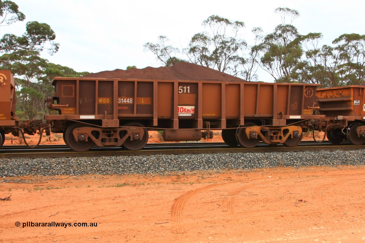 100605 9352
WOD type iron ore waggon WOD 31448 is one of a batch of sixty two built by Goninan WA between April and August 2000 with serial number 950086-020 and fleet number 511 for Koolyanobbing iron ore operations with a 75 ton capacity for Portman Mining to cart their Koolyanobbing iron ore to Esperance, now with PORTMAN painted out, Binduli Triangle, loaded with fines, 5th June 2010.
Keywords: WOD-type;WOD31448;Goninan-WA;950086-020;